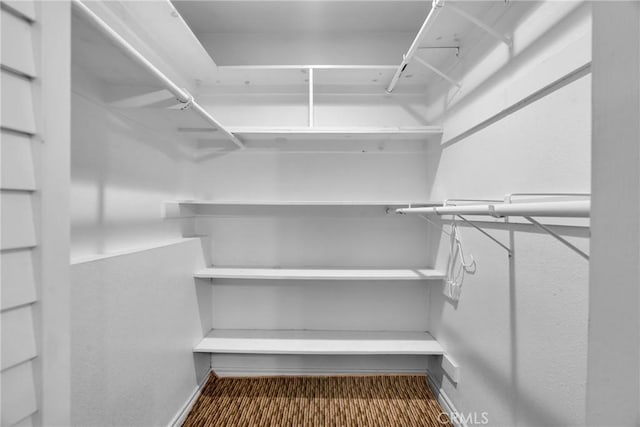 825 E Palm Ave, Monrovia, CA 91016 - walk in closet featuring carpet