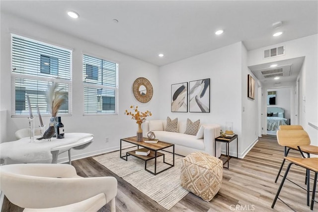 11047 Wander Dr, Rancho Cucamonga, CA 91730 - living area with light wood finished floors, baseboards, and recessed lighting