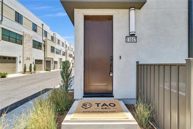11047 Wander Dr, Rancho Cucamonga, CA 91730 - view of exterior entry featuring stucco siding