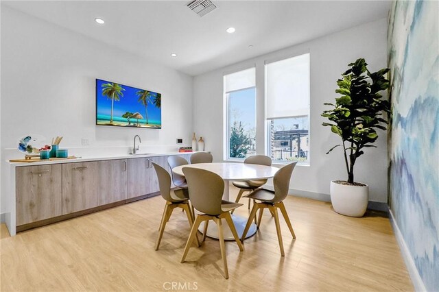 11047 Wander Dr, Rancho Cucamonga, CA 91730 - dining room featuring light wood-type flooring, recessed lighting, and baseboards