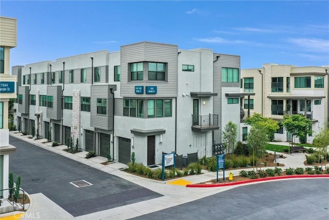 11047 Wander Dr, Rancho Cucamonga, CA 91730 - view of property featuring an attached garage