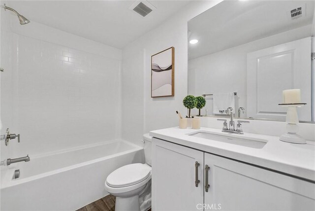 11047 Wander Dr, Rancho Cucamonga, CA 91730 - bathroom featuring toilet, wood finished floors, vanity, and  shower combination
