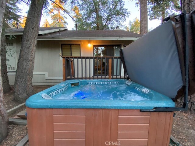 43133 Moonridge Rd, Big Bear, CA 92315 - rear view of house featuring a hot tub, a deck, and a shingled roof
