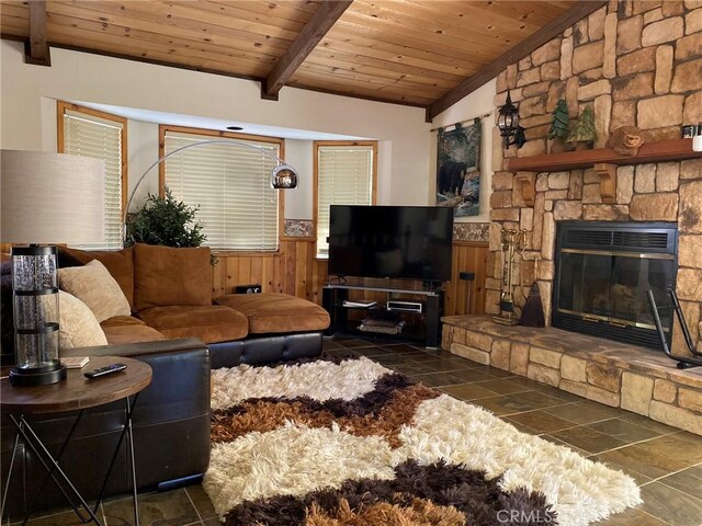 43133 Moonridge Rd, Big Bear, CA 92315 - tiled living area featuring wood ceiling, a wainscoted wall, and a fireplace