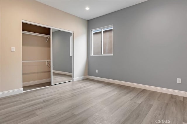 22022 Pioneer Blvd Unit A & B, Hawaiian Gardens, CA 90716 - unfurnished bedroom featuring wood finished floors, a closet, and recessed lighting