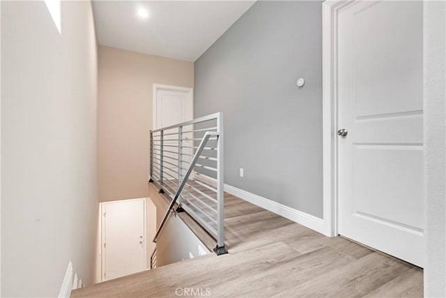 22022 Pioneer Blvd Unit A & B, Hawaiian Gardens, CA 90716 - stairs featuring wood finished floors and baseboards