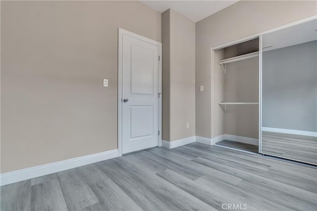 22022 Pioneer Blvd Unit A & B, Hawaiian Gardens, CA 90716 - unfurnished bedroom with wood finished floors and a closet