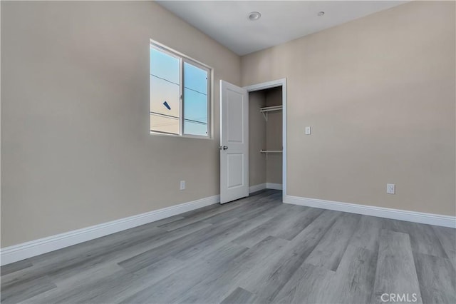 22022 Pioneer Blvd Unit A & B, Hawaiian Gardens, CA 90716 - unfurnished bedroom with wood finished floors and a closet