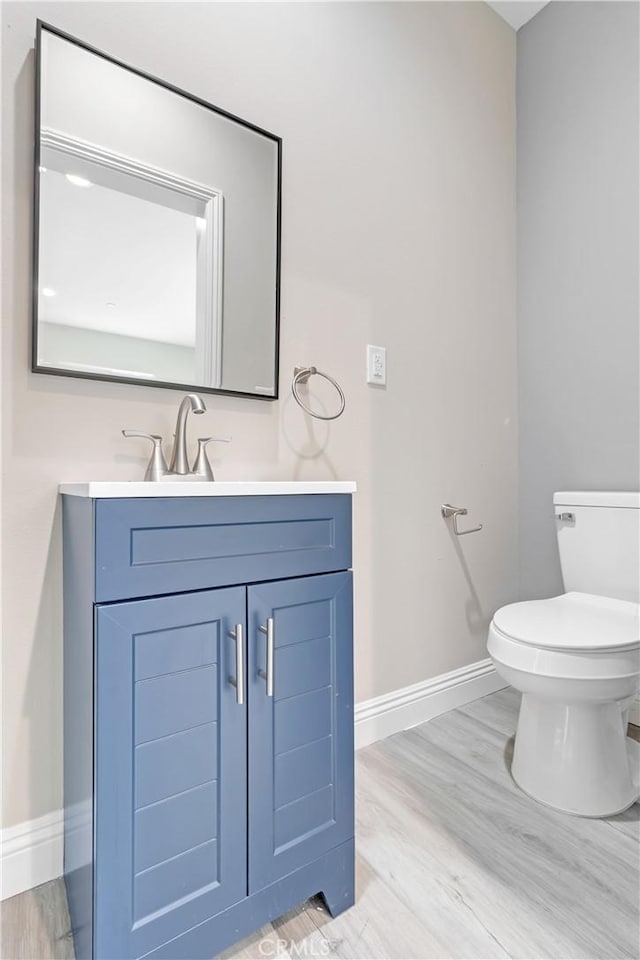22022 Pioneer Blvd Unit A & B, Hawaiian Gardens, CA 90716 - half bathroom featuring vanity and wood finished floors