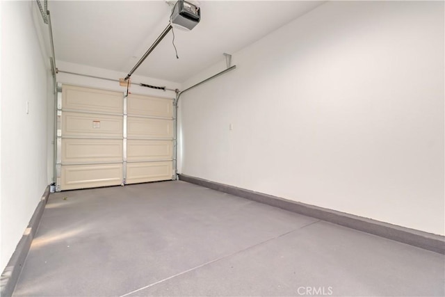 22022 Pioneer Blvd Unit A & B, Hawaiian Gardens, CA 90716 - garage with a garage door opener and baseboards