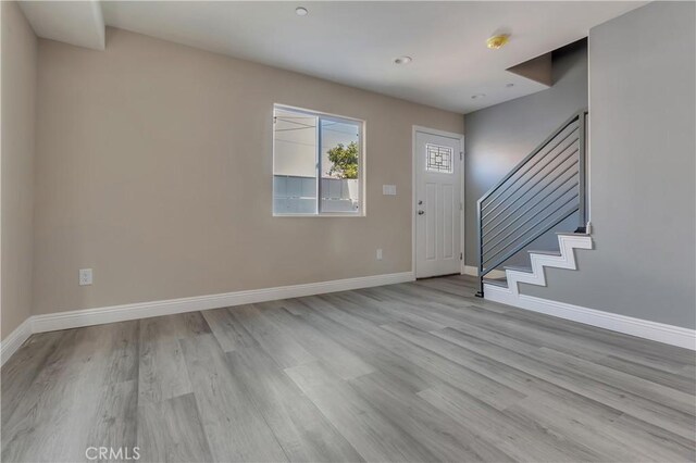 22022 Pioneer Blvd Unit A & B, Hawaiian Gardens, CA 90716 - entryway featuring light wood-style flooring and stairs