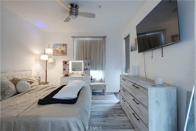 12668 Chapman Ave Unit 2108, Garden Grove, CA 92840 - bedroom featuring light wood-type flooring and ceiling fan