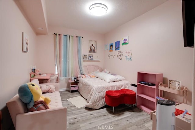 12668 Chapman Ave Unit 2108, Garden Grove, CA 92840 - bedroom featuring wood finished floors
