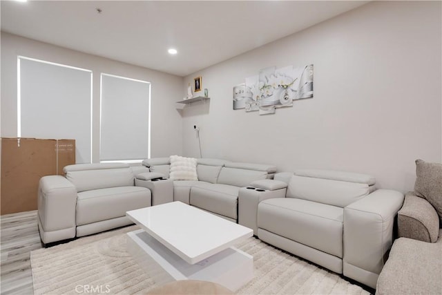 12668 Chapman Ave Unit 2108, Garden Grove, CA 92840 - living room featuring light wood finished floors and recessed lighting