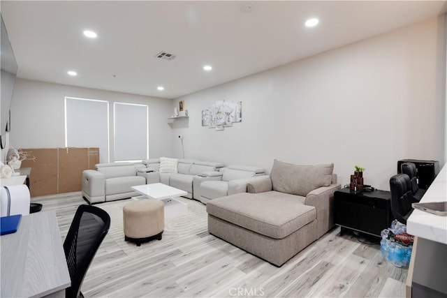 12668 Chapman Ave Unit 2108, Garden Grove, CA 92840 - living area featuring light wood-type flooring and recessed lighting