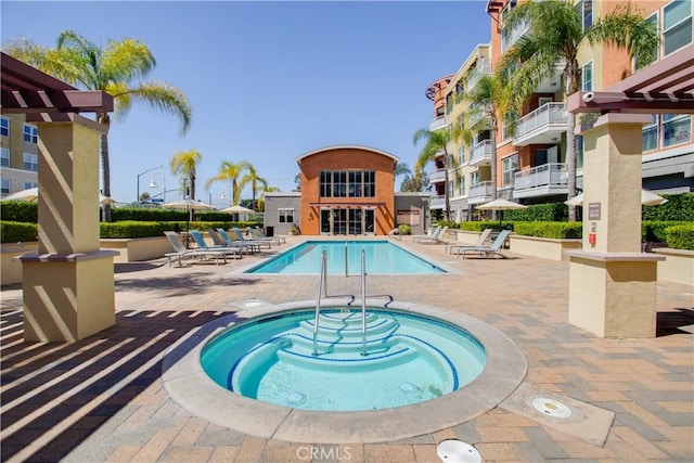12668 Chapman Ave Unit 2108, Garden Grove, CA 92840 - community pool featuring a community hot tub, a patio area, and a pergola