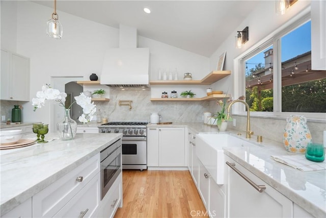 1247 Journeys End Dr, La Canada Flintridge, CA 91011 - kitchen with stainless steel appliances, open shelves, premium range hood, backsplash, and vaulted ceiling