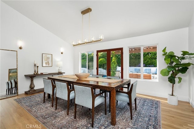 1247 Journeys End Dr, La Canada Flintridge, CA 91011 - dining room featuring healthy amount of natural light, light wood-type flooring, french doors, and high vaulted ceiling