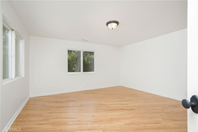 1247 Journeys End Dr, La Canada Flintridge, CA 91011 - spare room featuring plenty of natural light and light wood-style floors