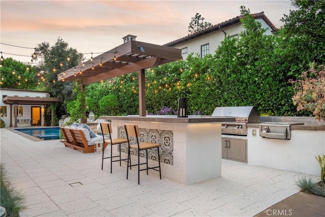1247 Journeys End Dr, La Canada Flintridge, CA 91011 - view of patio / terrace featuring area for grilling, exterior bar, a pergola, and an outdoor pool