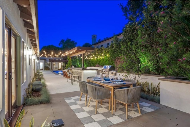 1247 Journeys End Dr, La Canada Flintridge, CA 91011 - patio at night featuring a patio area and area for grilling