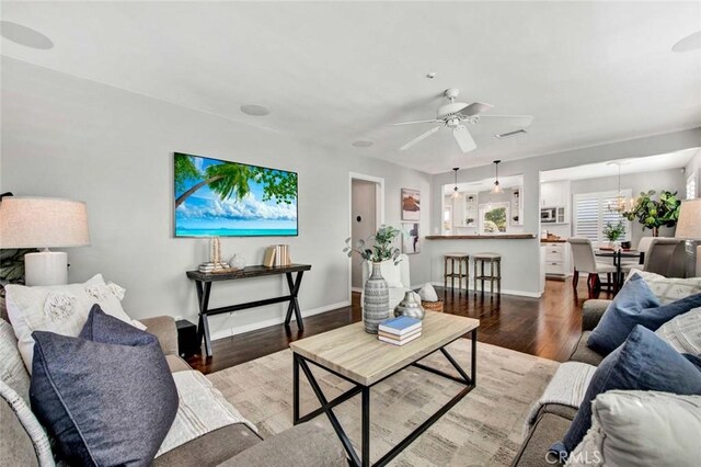 343 W Fletcher Ave, Orange, CA 92865 - living room with a ceiling fan, light wood-type flooring, and baseboards