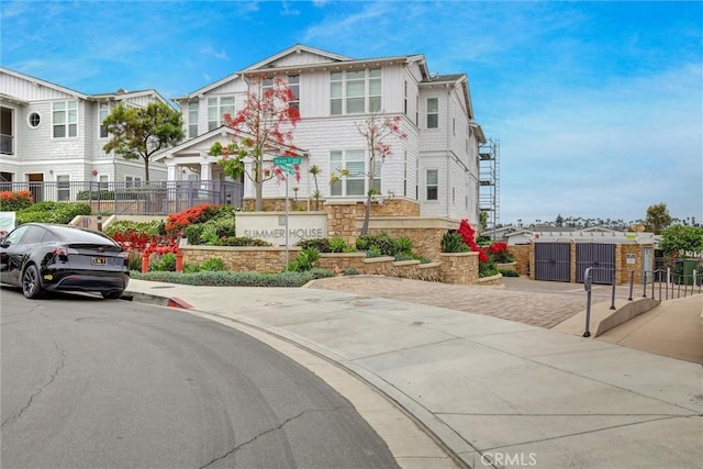 2393 Ocean St, Carlsbad, CA 92008 - view of front of house featuring stone siding and board and batten siding
