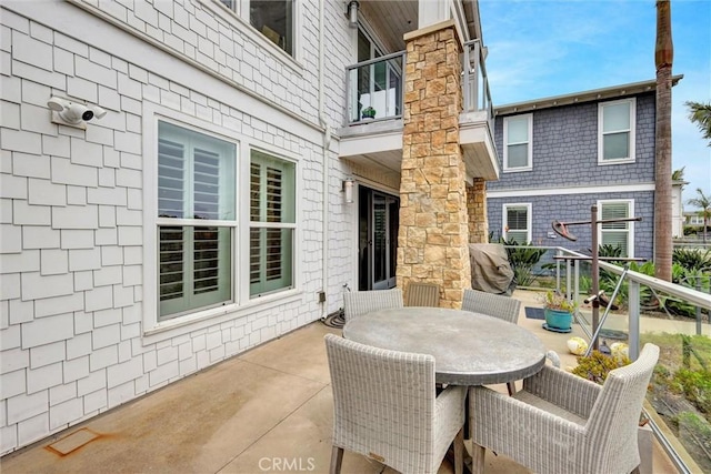 2393 Ocean St, Carlsbad, CA 92008 - view of patio featuring a balcony and outdoor dining space