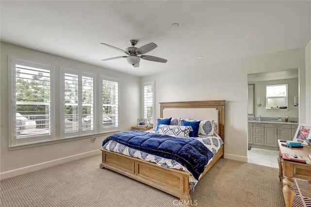 2393 Ocean St, Carlsbad, CA 92008 - bedroom with baseboards, multiple windows, and light colored carpet