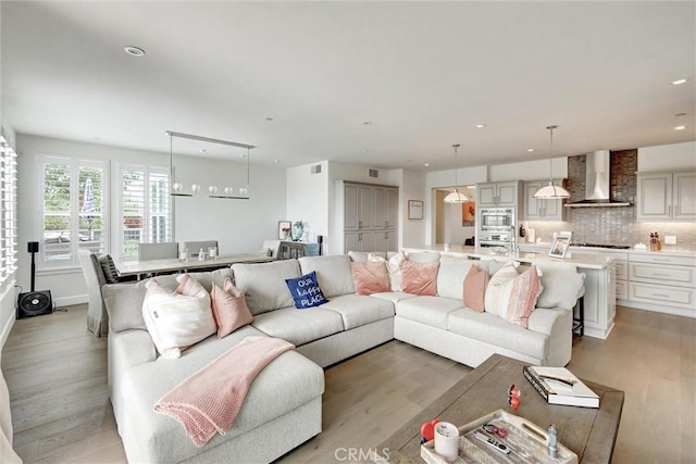2393 Ocean St, Carlsbad, CA 92008 - living area featuring light wood-type flooring and recessed lighting