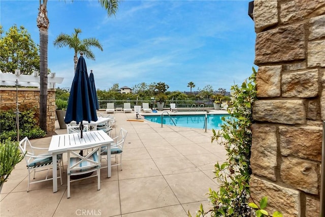 2393 Ocean St, Carlsbad, CA 92008 - community pool featuring a patio and outdoor dining area