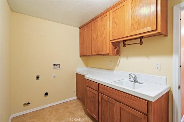 1550 Strawberry Ave, Arroyo Grande, CA 93420 - washroom featuring hookup for a washing machine, electric dryer hookup, cabinet space, baseboards, and hookup for a gas dryer