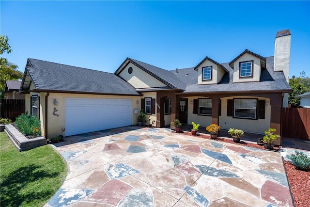 1550 Strawberry Ave, Arroyo Grande, CA 93420 - view of front facade with a chimney, an attached garage, stucco siding, concrete driveway, and a shingled roof