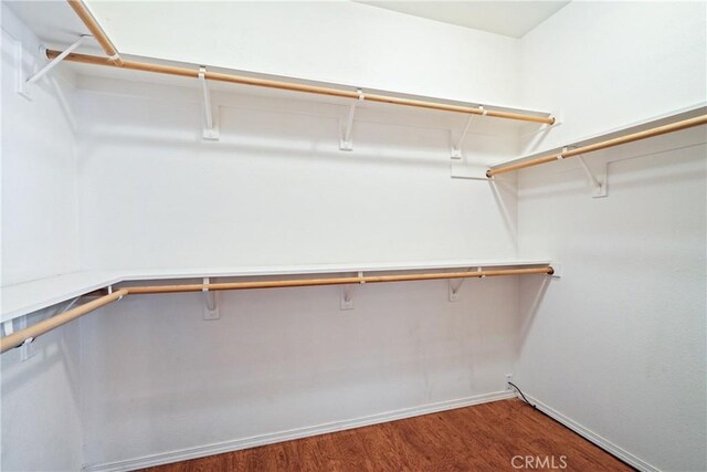 1550 Strawberry Ave, Arroyo Grande, CA 93420 - spacious closet featuring wood finished floors