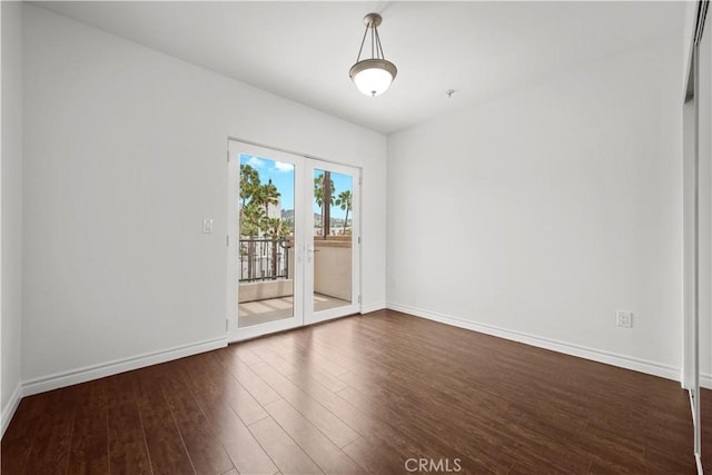 5633 Carlton Way Unit 503, Hollywood, CA 90028 - unfurnished room featuring dark wood finished floors and baseboards