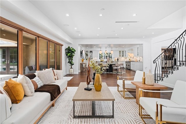 325 W Bellevue Dr, Pasadena, CA 91105 - living room featuring recessed lighting, wood finished floors, stairs, and french doors