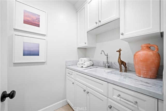 325 W Bellevue Dr, Pasadena, CA 91105 - kitchen with white cabinetry and light stone countertops