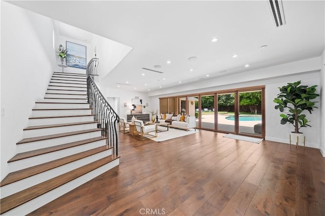 325 W Bellevue Dr, Pasadena, CA 91105 - living room featuring hardwood / wood-style flooring, stairs, and recessed lighting