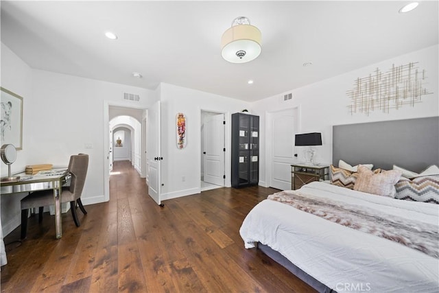 325 W Bellevue Dr, Pasadena, CA 91105 - bedroom with arched walkways, wood finished floors, and recessed lighting