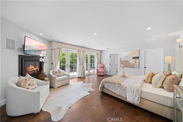 325 W Bellevue Dr, Pasadena, CA 91105 - bedroom with access to outside, a glass covered fireplace, wood finished floors, french doors, and recessed lighting