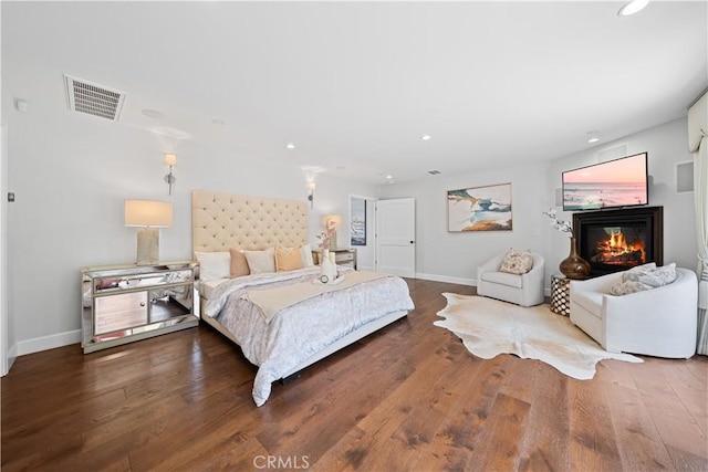 325 W Bellevue Dr, Pasadena, CA 91105 - bedroom with recessed lighting, wood finished floors, and a glass covered fireplace