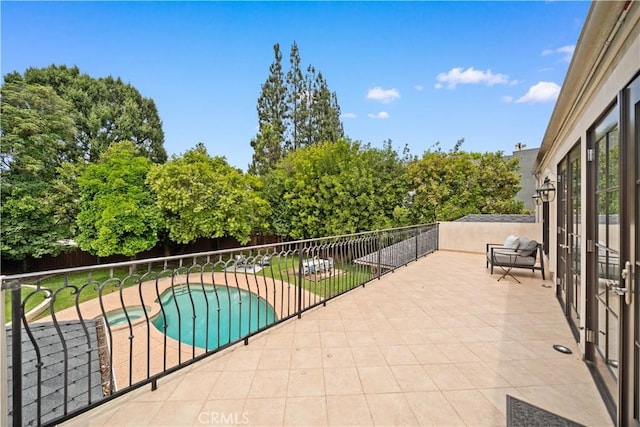 325 W Bellevue Dr, Pasadena, CA 91105 - fenced backyard featuring a patio area and a pool with connected hot tub