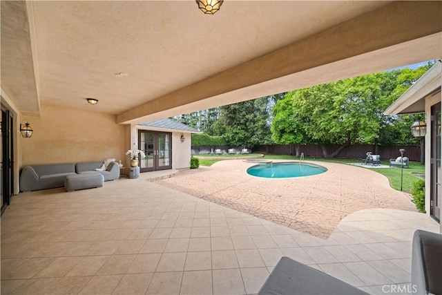 325 W Bellevue Dr, Pasadena, CA 91105 - view of swimming pool with french doors, a patio area, and a fenced backyard