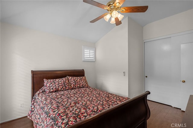 26320 Ivrea Pl, Valencia, CA 91355 - bedroom with vaulted ceiling, a closet, wood finished floors, and a ceiling fan