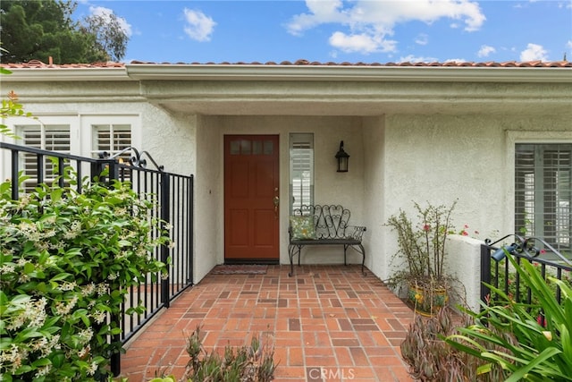 26320 Ivrea Pl, Valencia, CA 91355 - doorway to property with stucco siding