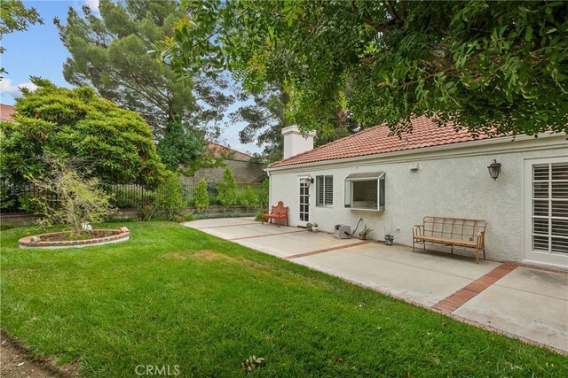 26320 Ivrea Pl, Valencia, CA 91355 - view of yard with a patio
