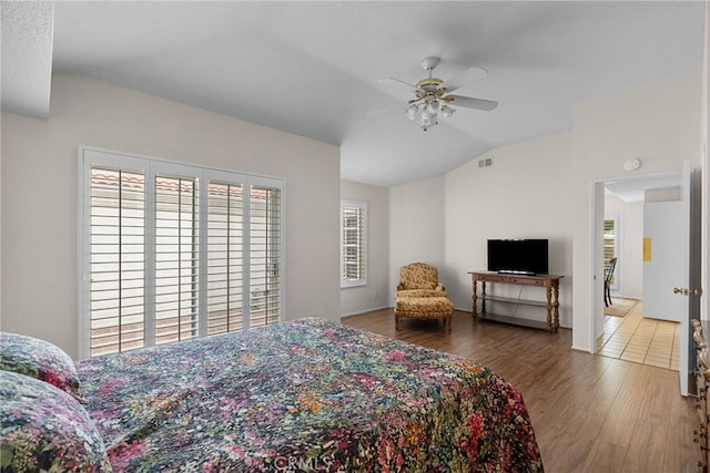 26320 Ivrea Pl, Valencia, CA 91355 - bedroom featuring lofted ceiling, wood finished floors, and ceiling fan