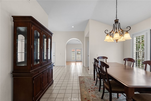 26320 Ivrea Pl, Valencia, CA 91355 - dining space featuring arched walkways, plenty of natural light, light tile patterned floors, and a chandelier
