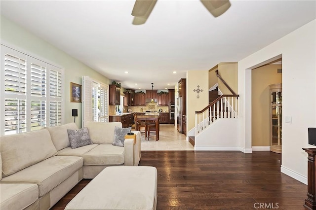 14160 Vai Brothers Dr, Rancho Cucamonga, CA 91739 - living room featuring stairway, wood-type flooring, recessed lighting, ceiling fan, and baseboards