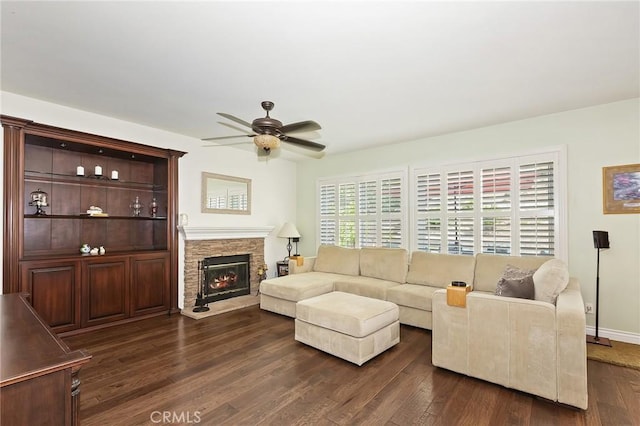 14160 Vai Brothers Dr, Rancho Cucamonga, CA 91739 - living area featuring a ceiling fan, dark wood-style floors, a fireplace, and baseboards